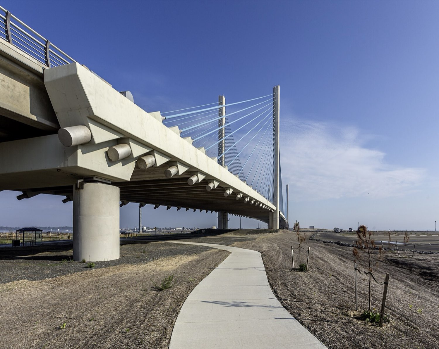A cable-stayed bridge under a clear sky